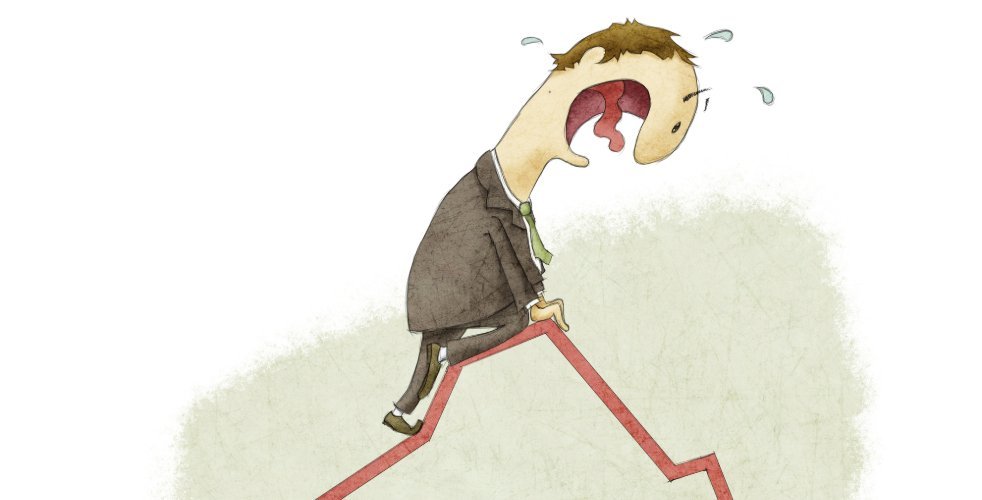 Scared cartoon man looking down a falling stock chart